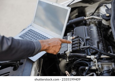 car mechanic working Engine repair and maintenance service - Powered by Shutterstock