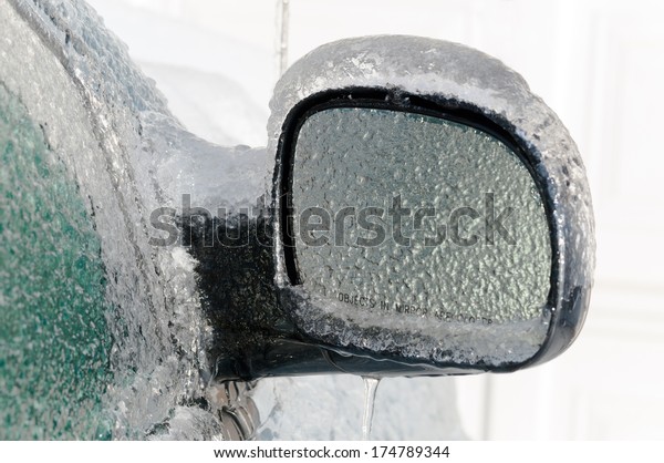 Car mirror after an ice\
storm