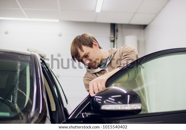 Car\
mirror man repair,Car accident broken side\
mirror.
