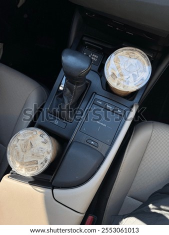 Car model: Lexus. two coffees