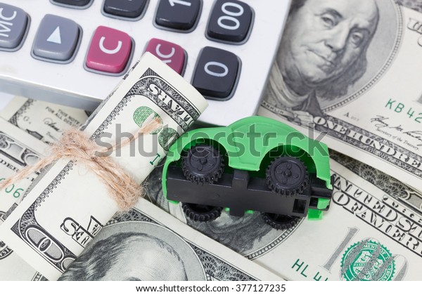 Car money and\
calculator. Payments and\
costs.