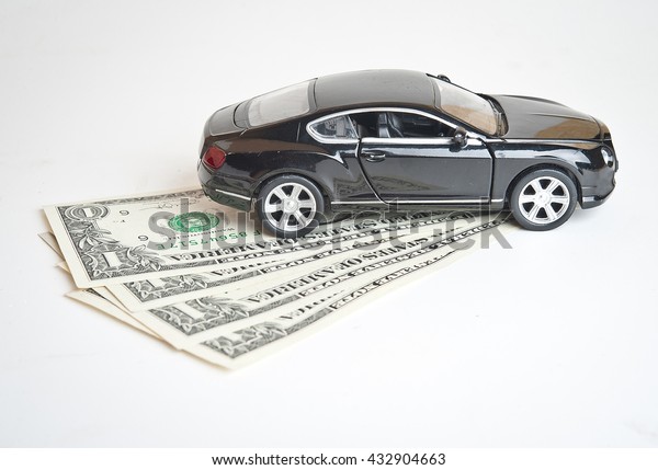 Car money
and calculator. Payments and costs. Car insurance. Automobile
collision damage waiver concepts. with protective gesture and icon
of car. Protection of car. Business concept.
