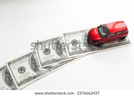 Car and money. Concept for buying, renting, insurance, fuel, service and repair costs