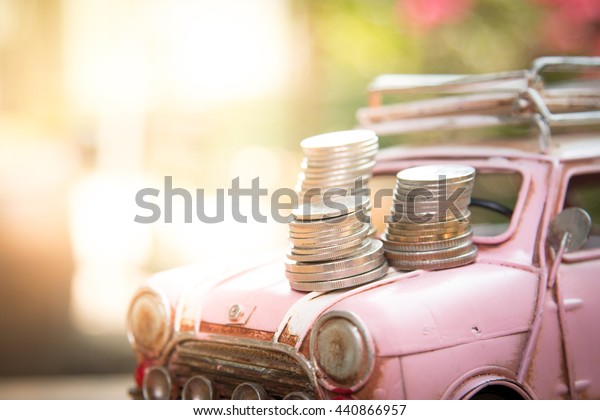 car\
and money with rays light flare , concept of car\
loan