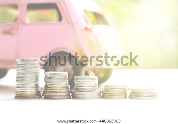 car\
and money with rays light flare , concept of car\
loan