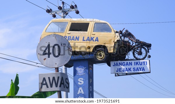 car and motorbike collided. Klaten, Indonesia - May\
12 2021