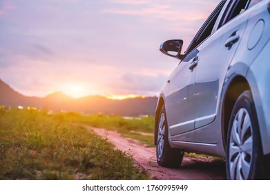 Car with mountain and grassland landscape. Travel and transport concept. - Shutterstock ID 1760995949
