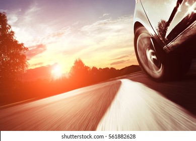 The car moves at fast speed at the night. Blured road with lights with car on high speed - Powered by Shutterstock