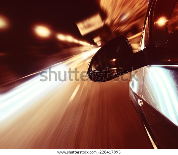 The car moves at\
great speed at the night
