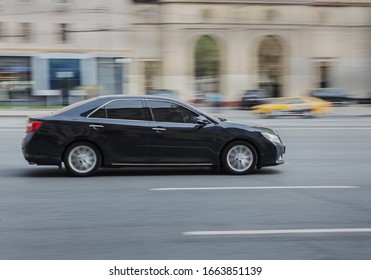 Car moves on a city street. Motion blur - Shutterstock ID 1663851139