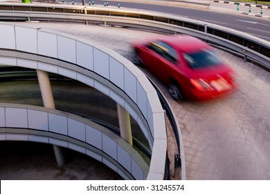 Car Moving Up A Parking Garage Ramp