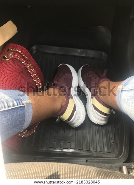 A car with my feet in\
trainers