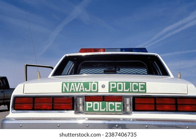 Car of the Navajo Nation Police with a clear blue sky