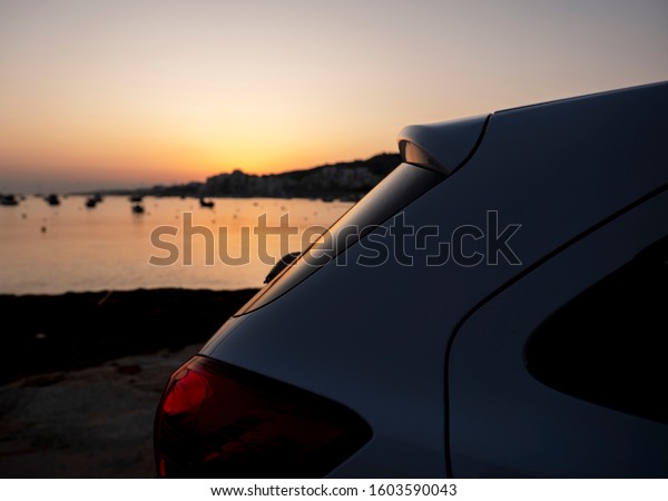 Car next to the\
sea