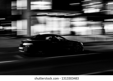 Car At Night In Black And White, In Wilmslow, Cheshire.