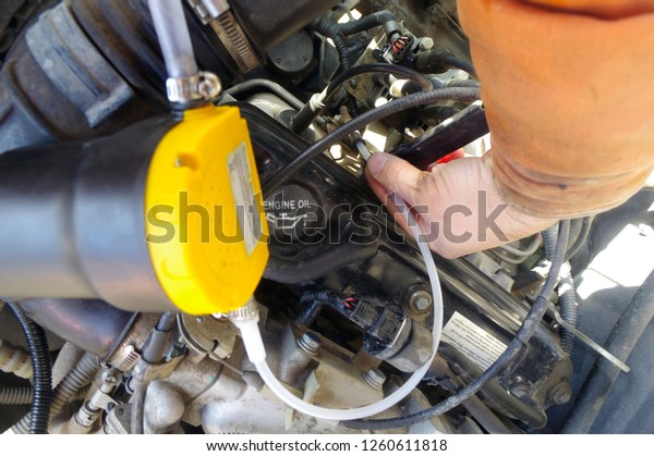 Car Oil Change Through Dipstick Pump Stock Photo Edit Now 1260611818