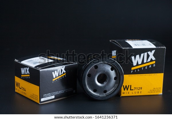 car oil filter wix. Wix filter. oil filter for\
car on black background