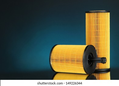 Car Oil Filters On Dark Color Background