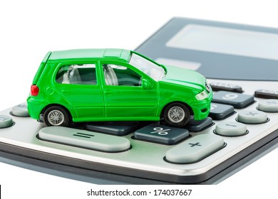 A Car Is On A Calculator. Cost Of Gasoline, Wear And Insurance. Car Costs Are Not Paid By Commuter Tax.