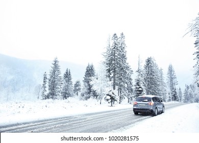 Car On Country Road In Snowy Weather