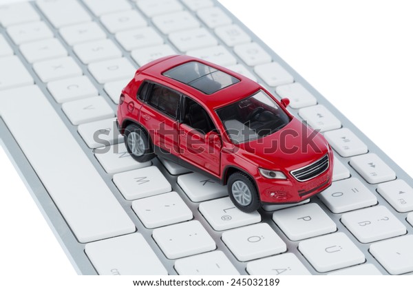 car on keyboard symbol photo for car buying and
car trade on the internet