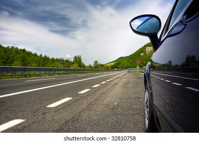 Car On A Road In The Countryside