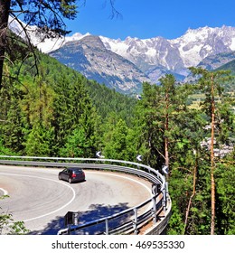 Car On The Winding Road In Mountains, Italian Alps