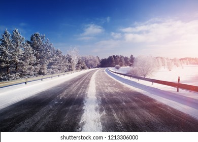 Car On Winter Road Covered With Snow