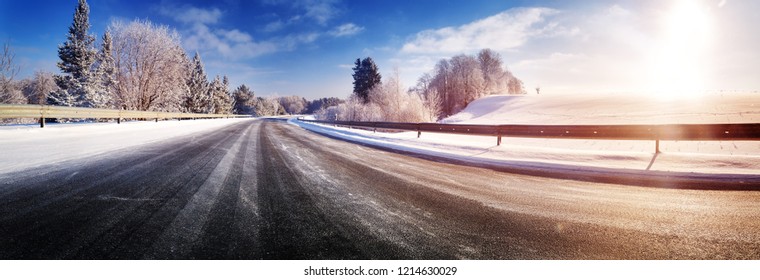 Car On Winter Road Covered With Snow