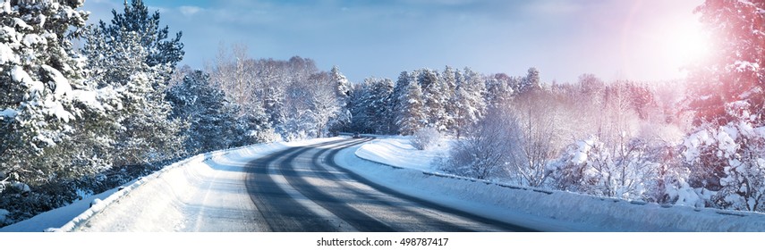 Car on winter road covered with snow
