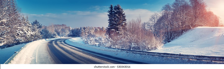 Car On Winter Road Covered With Snow