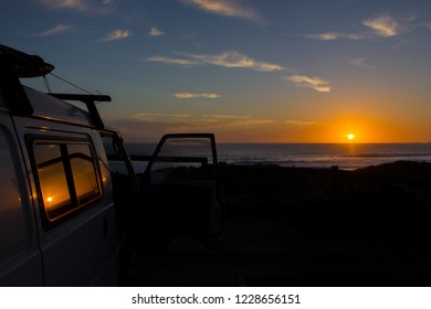 Car With Open Front Door At Cape Woolamai Beach On Sunset; Phillip Island, Victoria, Australia