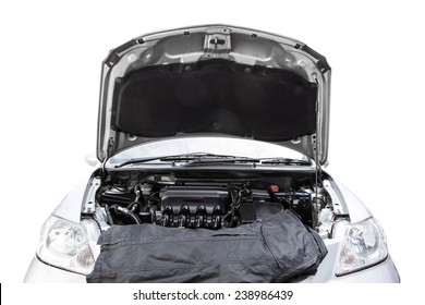 Car With Open Hood In Auto Repair Shop Isolated On White Background With Clipping Path