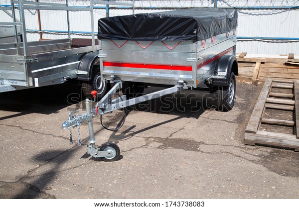 Car open\
trailer.A store that sells car trailers. Repair and maintenance of\
trailers for passenger\
cars.