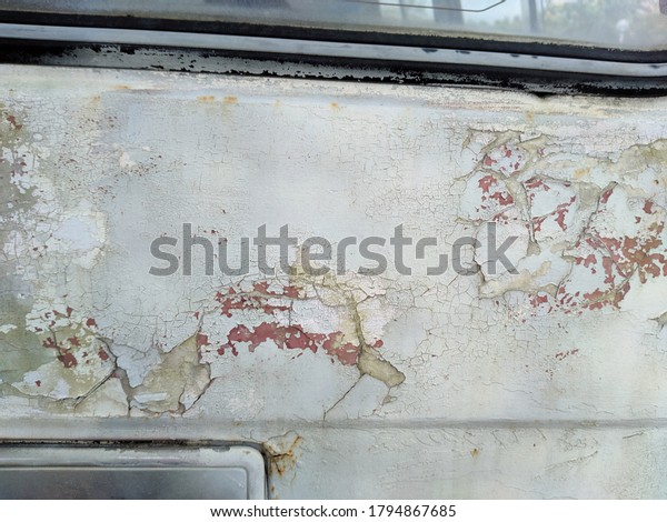 car paint\
has peeled off because the car is too\
old