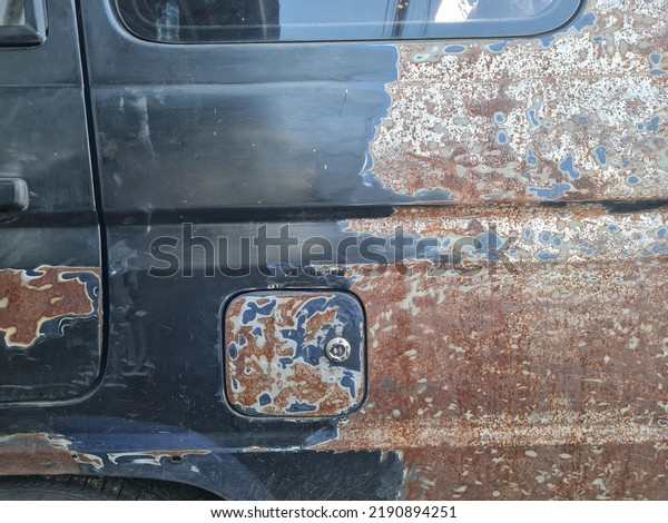 Car Paint Oxidation and\
Faded Paint. bad quality car paint eroded weather. dull and not\
shiny paint