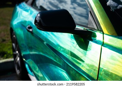 The Car Is Painted In Chameleon Paint With A Greenish-yellow Tint.