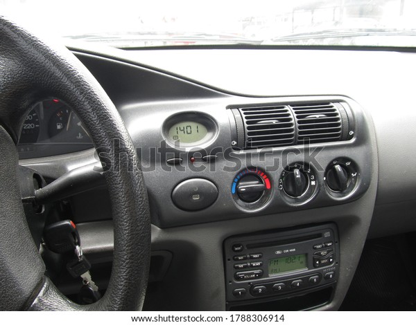 car panel\
with a digital clock and radio cd\
player
