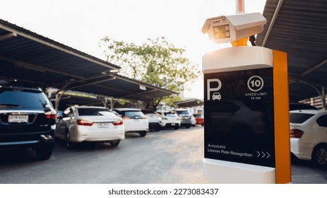 Car park automatic entry system. Security system for building access - barrier gate stop with toll booth, Security CCTV camera