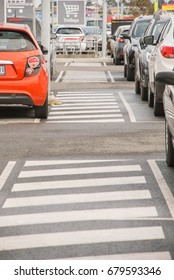 Car Park By The Supermarket, Pedestrian Cross At The Parking Lot, Trolley Sign And The Trolley Space, Cars Parked Around The Crossing. Victoria, Australia