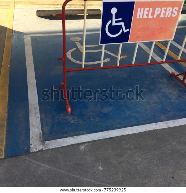 Car park for disabled, impotent, inefficient\
at store, hospital or\
suppermarket