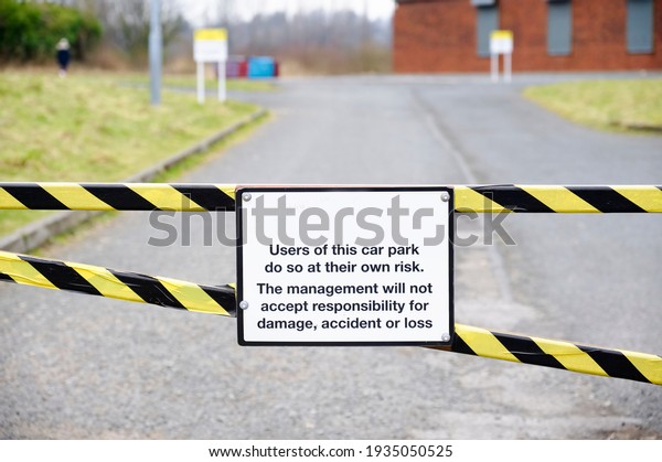 Car park users do so at\
own risk sign