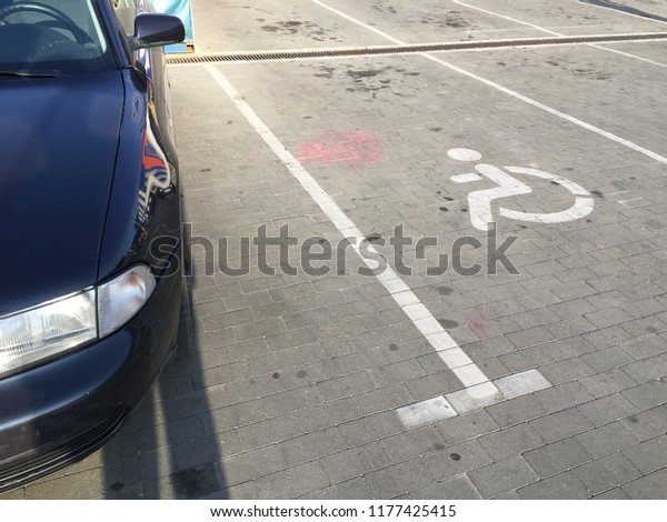 Car parked in the disabled parking. Empty\
Disabled Parking