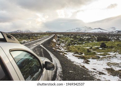 Car Parked On The Icelandic Road To The Mountains