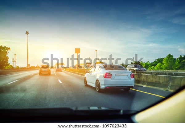 Car parked on road,Car on street and driving on
highway road