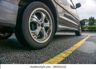 A Car Parked At Parking Lot