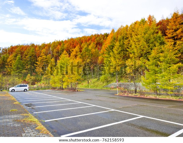 Car parking lot\
along the road near the Lake Shikaribetsu, which is one of the\
tourist spot in Hokkaido,\
Japan.