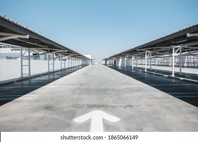 Car Parking Lot Area On Deck Floor Of Shopping Mall, Perspective View Empty Of Car Park Structure Building At Department Store. Auto Service Parking Lots