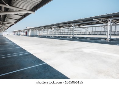 Car Parking Lot Area On Deck Floor Of Shopping Mall, Perspective View Empty Of Car Park Structure Building At Department Store. Auto Service Parking Lots