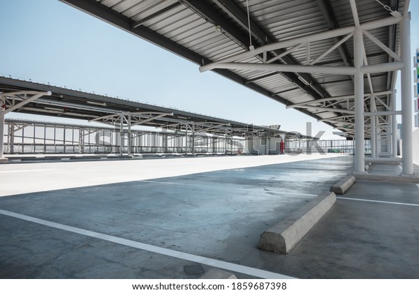 Car Parking Lot Area on Deck Floor\
of Shopping Mall, Perspective View Empty of Car Park Structure\
Building at Department Store. Auto Service Parking\
Lots